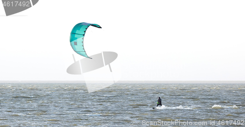 Image of Kitesurfing on the waves