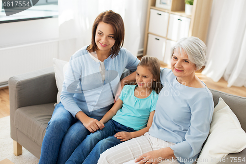 Image of portrait of mother, daughter and grandmother