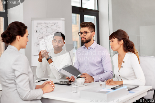 Image of recruiters having job interview with employee