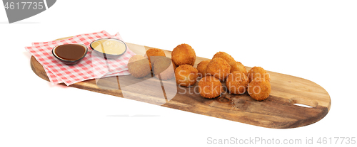 Image of Dutch traditional snack bitterbal with a dutch flag