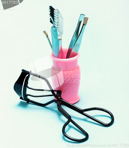 Image of Cosmetic Makeup Tools Indicates Eyelash Curlers And Eyebrow 