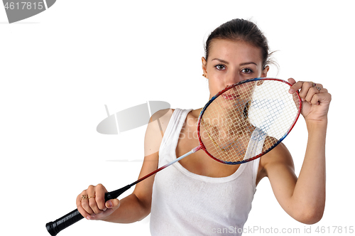 Image of Beautiful girl with badminton racket in hands
