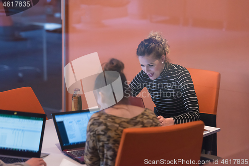 Image of startup Businesswomen Working With laptop in creative office