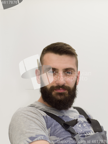 Image of portrait of bearded hipster handyman