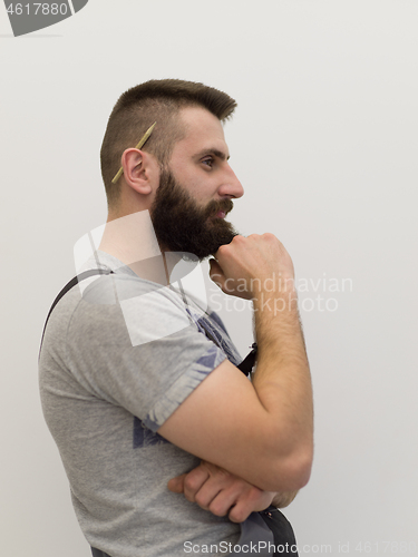 Image of portrait of bearded hipster handyman