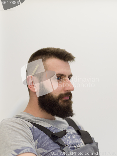 Image of portrait of bearded hipster handyman