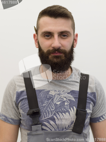 Image of portrait of bearded hipster handyman