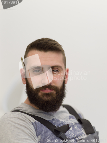 Image of portrait of bearded hipster handyman