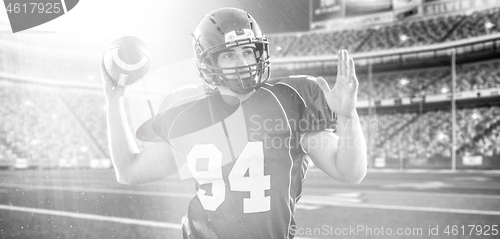 Image of american football player throwing ball