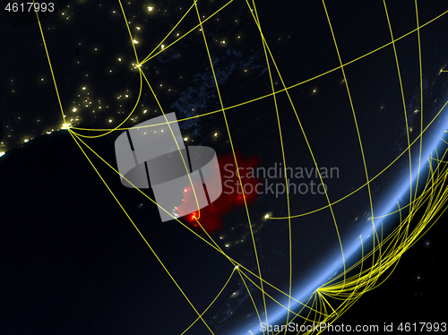 Image of Gabon on dark Earth with network