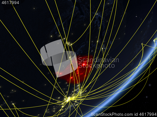 Image of Zimbabwe on dark Earth with network