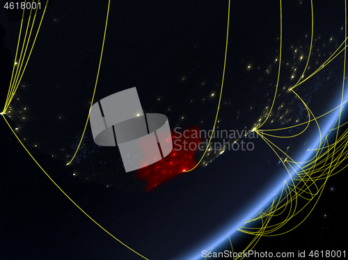 Image of Ivory Coast on dark Earth with network