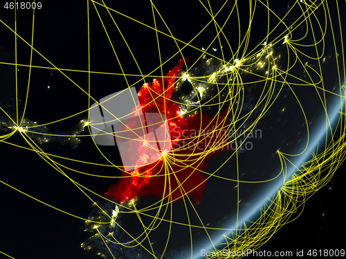 Image of Colombia on dark Earth with network