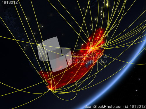 Image of South Africa on dark Earth with network