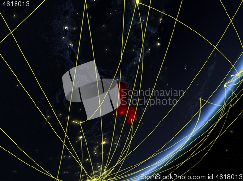 Image of Malawi on dark Earth with network