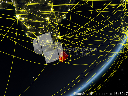 Image of Sri Lanka on dark Earth with network