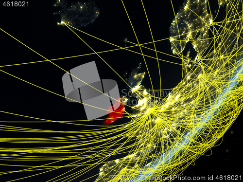 Image of Ireland on dark Earth with network