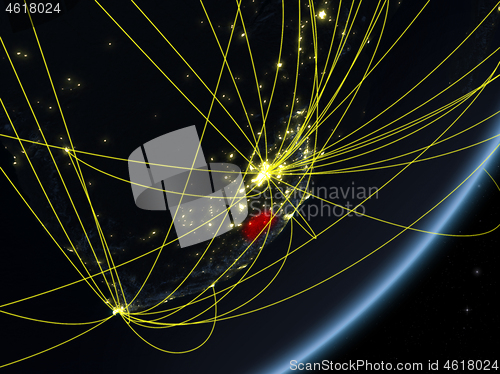 Image of Lesotho on dark Earth with network