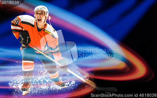 Image of a girl hockey player in uniform posing with helmets off in front of red