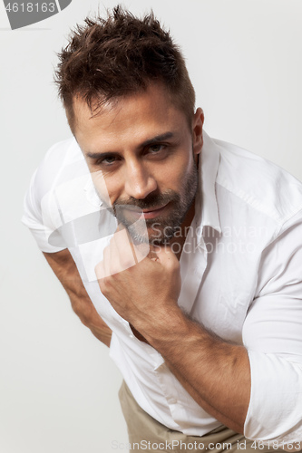 Image of bearded man open shirt
