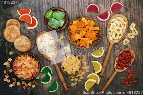 Image of Dried Fruit Selection on Rustic Wood