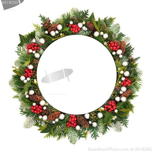 Image of Christmas Decorative Table Setting with Winter Greenery