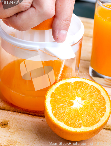 Image of Freshly Squeezed Juice Shows Healthy Orange Drink And Drinking 