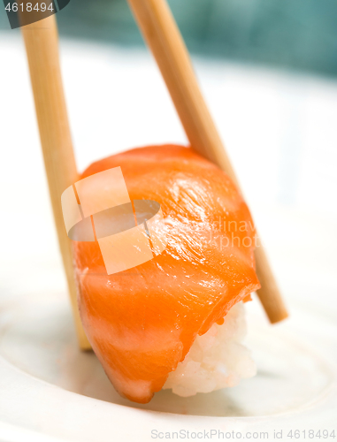 Image of Delicious Salmon Sushi Represents Japanese Food And Delicacy 