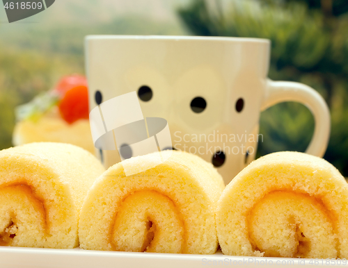 Image of Coffee Swiss Roll Indicates Orange Flavored Cake And Break 