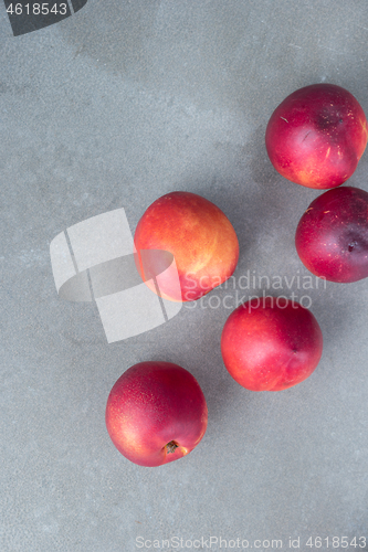 Image of Fresh peaches on concrete