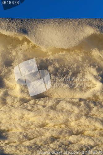 Image of Snow at sunset close-up