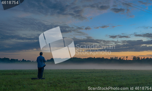Image of Photographer in a fog field