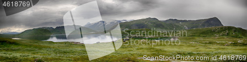 Image of Beautiful mountain landscape panorama with lake and clouds