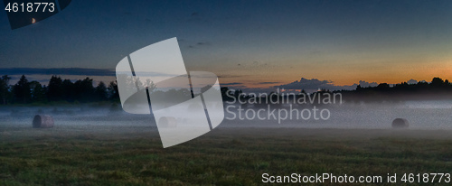 Image of Evening fog in european field