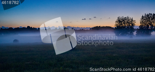 Image of Evening fog in european field