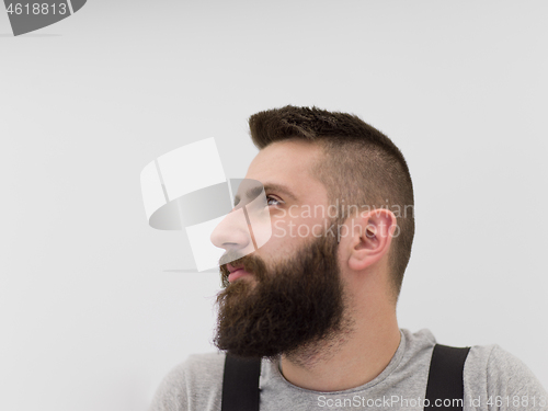 Image of portrait of bearded hipster handyman isolated on white