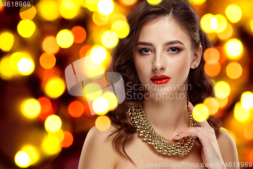 Image of Beautiful girl and shiny background with lights