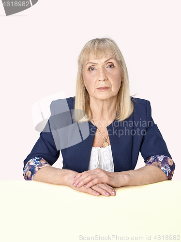 Image of Senior woman thinking about her sad life.