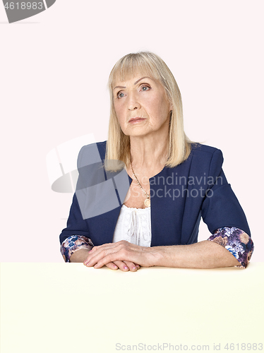 Image of Senior woman thinking about her sad life.