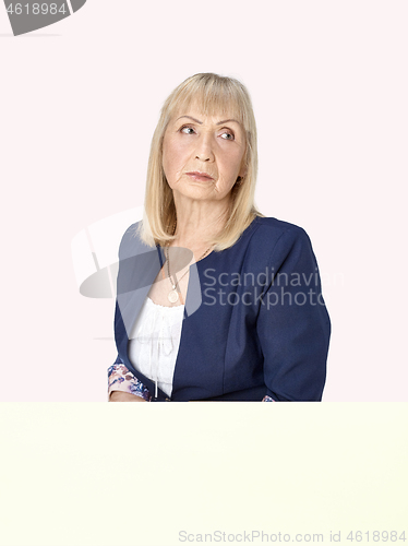 Image of Senior woman thinking about her sad life.