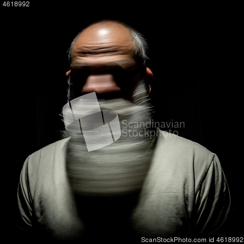 Image of bearded man motion blur portrait