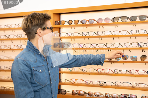 Image of woman in a eyewear store