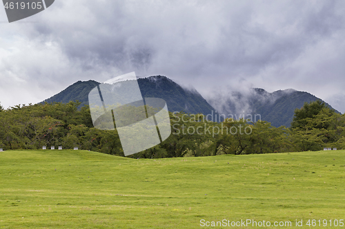 Image of Mountains background with white cloudy sky. Kawaguchi, Japan.