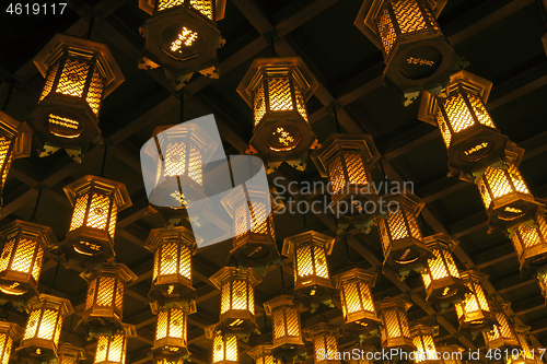 Image of Thousands of lanterns hanging on the ceiling of Buddhist temple Shrine.