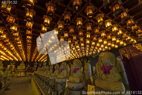 Image of Thousands of lanterns hanging on the ceiling of Buddhist temple Shrine.