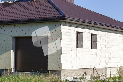 Image of construction of small house