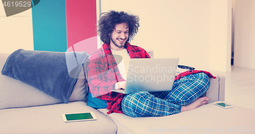 Image of man drinking coffee enjoying relaxing lifestyle