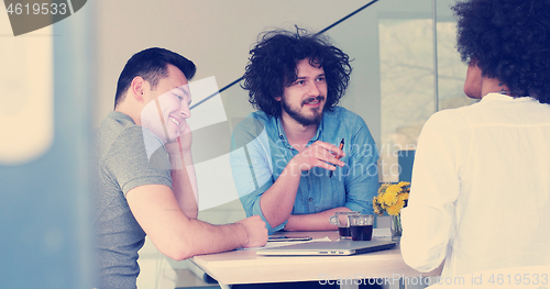 Image of Multiethnic startup business team on meeting