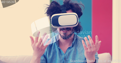 Image of man using VR-headset glasses of virtual reality