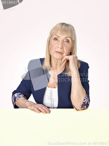 Image of Senior woman thinking about her sad life.